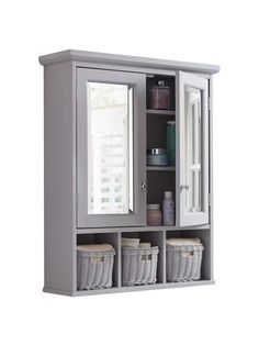 a gray cabinet with two baskets and a mirror