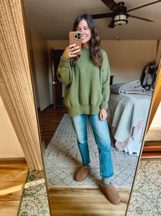 oversized green sweater outfit, jeans and Bearpaw slippers outfit, cozy socks winter outfit idea, casual winter outfit with slippers, how to style an oversized sweater, comfy winter loungewear outfit, cozy green sweater look, relaxed winter fashion inspiration, casual weekend outfit Pinterest, Bearpaw slippers cozy style, winter outfit with jeans and sweater, comfy cold weather outfit, cozy casual winter fashion, effortless winter style ideas, warm and stylish winter outfit inspo Socks Winter Outfit, Winter Outfit With Jeans, Outfit With Slippers, Oversized Sweater Aesthetic, Style An Oversized Sweater, Tasman Outfit, Oversized Green Sweater, Ugg Tasman Outfit, Winter Socks Cozy