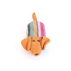 a stuffed animal with a colorful hat on it's head