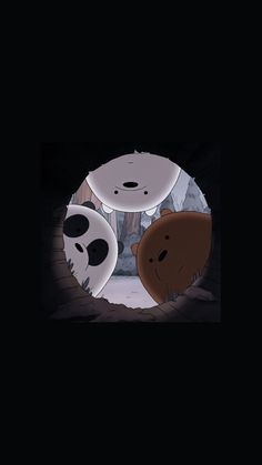 two pandas are standing in the dark