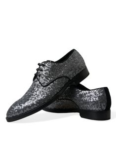 DOLCE & GABBANA Gorgeous brand new with tags, 100% Authentic Dolce & Gabbana mens sequined derby dress shoes. Model: Derby Color: Silver and black Material: Leather Leather outer sole Lace up closure Logo details Made in Italy Very exclusive and high craftsmanship Party Lace-up Brogue Wingtip Shoes, Fitted Plain Toe Dress Shoes For Party, Party Dress Shoes With Brogue Detailing And Plain Toe, Wingtip Dress Shoes For Party, Party Dress Shoes With Brogue Detailing, Plain Toe Leather Sole Dress Shoes For Party, Plain Toe Dress Shoes With Leather Sole For Party, Party Dress Shoes With Leather Sole And Plain Toe, Fitted Lace-up Party Shoes With Leather Sole