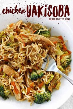 a white bowl filled with noodles and broccoli