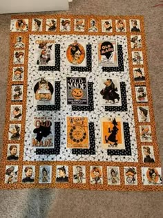 a quilt made to look like it has many pictures on the front and back of it