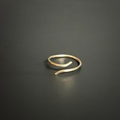 Lovely handcrafted solid gold ring. Use it as a midi ring, toe ring or knuckle ring. The ring is created of 9K, 14K, 18K yellow, white or rose solid gold of your choice, see variations in drop-down menu. The ring is stamped with solid gold marking. Ring thickness: 16 gauge (1.2 mm) Ring size: US 2-6  Made to order. Will arrive in a pretty gift box ready to give or keep. All the designing, sawing, sanding, polishing, soldering, stamping, doming and wire work was done by me in my home studio in Re Biking Quotes Cycling, Biking Quotes, Rings For Women Gold, Midi Rings Gold, Gold Toe Rings, Knuckle Ring, Ringe Gold, Midi Ring, Knuckle Rings