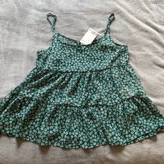 New With Tags! Super Cute With A Pair Of Jean Shorts Adjustable Straps! H&m Summer Beach Tops, H&m Green Tops For Spring, H&m Spring Tops For Vacation, H&m Tops For Spring/summer, H&m Spring Cami Tops, H&m Cotton Top For Vacation, H&m Floral Print Tops For Day Out, H&m Sleeveless Beach Tops, Casual Green H&m Tops