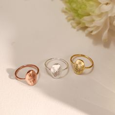 "Introducing our stunning Birth Flower Ring, a beautifully crafted piece of jewelry that allows you to celebrate your unique birth month while also honoring the special relationships in your life. This ring is the perfect way to symbolize the bond you share with your family, best friends, bridesmaids, or mother-daughter relationships. Each ring is made to order and personalized with the birth flowers of your choosing. This makes it a truly unique and thoughtful gift for any occasion, whether it' Rose Gold Birth Flower Ring, Oval Engraved Flower Ring For Anniversary, Heirloom Birth Flower Jewelry For Anniversary, Nature-inspired Rose Gold Flower Ring As Gift, Gold Sterling Silver Rings With Birth Flower Detail, Nature-inspired Wedding Flower Ring With Birth Flower, Birth Flower Promise Ring, Personalized Silver Flower Ring For Anniversary, Oval Birth Flower Jewelry For Anniversary