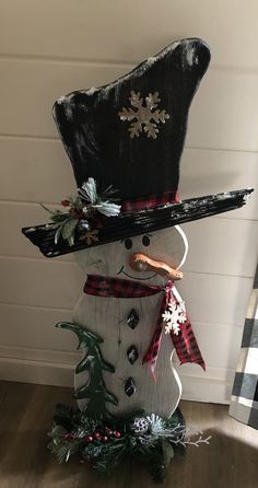 a snowman made out of an old hat