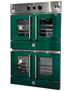 two green ovens side by side with the doors open