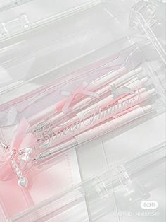 three different types of toothbrushes in a clear plastic case on top of each other