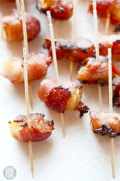 bacon wrapped skewers on toothpicks are ready to be eaten