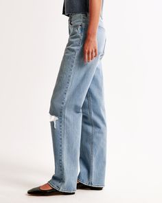 Our new classic vintage straight jeans in a light wash, with knee blowout detail and a clean hem. This fit features a 10.5” high rise, is relaxed at the waist and hips, and has an easy straight-leg shape. This jean is made from our vintage stretch fabric which features both an authentic vintage look and contains slight built-in stretch for additional comfort. Vintage Straight Jeans, Low Rise Baggy Jeans, Baggy Jean, Women's Bottoms, Suits Coats, New Classic, Athletic Fits, New Arrival Dress, Baggy Jeans