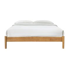 an image of a bed with white sheets and pillows on the headboard or foot board