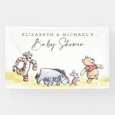 a baby shower banner with winnie the pooh and other cartoon characters on it's side