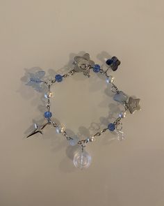 This cute blue fairycore bracelet is adorned with butterflies and stars. Dark blue beads with white pearls gives it it's starry night aesthetic. IMPORTANT: Make sure this bracelet is your size. It is 7 inches and the size can't be readjusted due to toggle clasp. To make sure it fits you take a measuring tape and put it around your wrist. From there you can decide if this bracelet size is right for you :) Blue Bracelet Ideas, Fairycore Bracelet, Starry Night Aesthetic, Blue Beads Bracelet, Dark Blue Bracelet, Blue Starry Night, Blue Bracelets, Girly Bracelets, Gray Bracelet