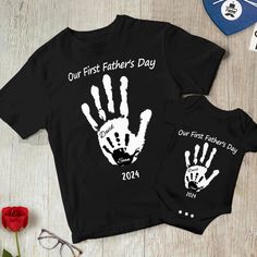 Friendly Reminder: This product is for the Daddy T-shirt only. The Babysuit needs to be purchased separately. Our personalized handprint father and baby set is the perfect gift for any new dad celebrating his first Father's Day or simply becoming a father! The matching set will make for an awesome photo opportunity for dad and baby to cherish forever. The matching set can be worn on Father's Day or any day after that, making it a versatile addition to any wardrobe. Dad and baby can wear their matching shirts to family gatherings, outings, or even just around the house. Customize the t-shirt by adding the names of the father and child to the handprints. You can customize before purchasing.  Key features: - High-quality cotton t-shirt - Customizable Design - Handprints motif - Perfect for Fa Photo Opportunity, Dad And Baby, Father And Baby, First Fathers Day, Gifts For New Dads, Friendly Reminder, Baby Set, New Dads, Gift For Dad