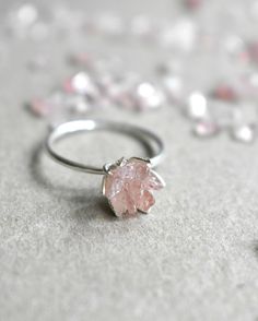 Strawberry Quartz ring in my copyrighted lotus flower design. Set into a handcrafted 925 sterling silver band and silver tone etched cup. Each piece of raw Strawberry Quartz is placed randomly in a mosaic way. You will find a mix of pink and clear shades in a floral leaf pattern. A perfect Libra zodiac gemstone ring and heart chakra energy. Ready to ship in under 3 business days. I love this ring as sparkly, any occasion present for her, pink engagement ring, Pink Libra zodiac birthstone gift, B Engagement Rings Quartz, Pink Crystal Ring, Flower Shaped Gemstone Rings For Gifts, Flower Shaped Gemstone Ring For Gift, Flower Shaped Gemstone Ring Gift, Spiritual Flower Shaped Rings As Gifts, Sagittarius Jewelry, Unique Opal Ring, Crystal Engagement Ring