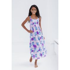 Get ready for a day filled with Disney magic in this stylish Disney maxi dress! This comfy and casual sundress features a fashionable smocked bodice, a pretty ruffle hem, and colorful Disney artwork your little girl will love to wear! Choose from a pink flower design with an all over print of Minnie Mouse and a purple Hawaiian design with artwork of Stitch from Lilo and Stitch. Made of a soft and lightweight material that keeps your child comfortable all day long, this cute Disney ruffle hem dress is a spring and summer outfit essential! Disney Cotton Summer Dress, Disney Short Sleeve Dresses With Character Print, Mirabel Encanto Toddler Dress, Summer Unicorn Print Princess Dress For Dress-up, Disney Cotton Sleepwear With Character Print, Floor Length Maxi Dress, Casual Sundress, Hawaiian Designs, Girls Smock