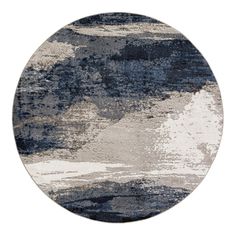 a round rug with an abstract design in grey and blue tones on the bottom half