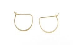 If you're looking an easy to wear, low profile hoop, with effortless minimalist style - that you can comfortably sleep in, shower in, swim in... Meredith is for you. 18ga wire approx. 0.5" x 0.5" hammer texture on center of hoop Modern Adjustable Nickel-free Huggie Earrings, Minimalist Brass Huggie Earrings, Minimalist Everyday Brass Huggie Earrings, Everyday Minimalist Brass Huggie Earrings, Everyday Small Hoop Huggie Earrings With Hammered Detail, Everyday Small Hoop Hammered Huggie Earrings, Hammered Small Hoop Huggie Earrings, Simple Adjustable Hammered Jewelry, Minimalist Everyday Hammered Huggie Earrings