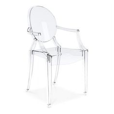 This Crystal Dining Chair is based on classical designs and is made from single-mold clear polycarbonate plastic. Whether positioned behind a desk, grouped around a modern-style dining table, or perched on a patio for open-air cocktails, this durable seat is sure to draw attention from any crowd. Features: Material: Acrylic Finish: Clear This crystal clear ghost style plastic modern dining chair is based on classical designs and is made from single-mold clear polycarbonate plastic. The clear pla Lucite Chairs, Bubble Chair, Ghost Chairs, Leather Dining, Modern Dining Chairs, Dining Arm Chair, Modern Branding, Side Chairs Dining, Kitchen Chairs