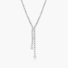 14K White Gold Lariat Diamond Necklace. This stunning lariat necklace will bring the sparkle and utmost elegance to your neckline. Luxury Drop Lariat Necklace For Formal Occasions, Luxury Drop Lariat Necklace For Formal Events, Luxury Formal Drop Lariat Necklace, Formal White Gold Drop Lariat Necklace, Elegant White Gold Lariat Necklace With Brilliant Cut, White Gold Lariat Diamond Necklace For Formal Occasions, Formal Long Drop Diamond Necklace In Fine Jewelry Style, Elegant Long Drop Diamond Necklace For Formal Occasions, Elegant Single Strand Long Drop Necklace