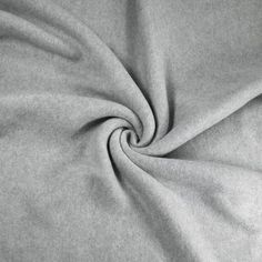 a close up view of a grey fabric