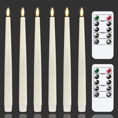 six candles with remote controls in front of them