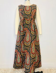 "Rare and unique Handmade quilted maxi dress Vintage from the late 1960's early 1970's Made from a cotton quilted fabric Slight empire waist A-line skirt Sleeveless Dress has some wear in the inside (as shown in photos)  The dress is sturdy and wearable. Zipper at back Would best fit a S/M pit to pit - 19\" waist at empire (under bust) - 30\" shoulder to waist - 13\" hips - 48\" skirt length - 34.5\" overall length  - 47.5\"" Maxi Dress Vintage, Quilted Fabric, Vintage Maxi Dress, Dress Vintage, Dress Clothes For Women, A Line Skirt, Empire Waist, Skirt Length, A Line Skirts