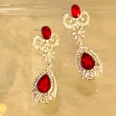 Pageant Earrings Bridal Earrings Red Crystal Silver Crystals Elegant Valentine's Day Earrings For Festive Occasions, Elegant Valentine's Day Festive Earrings, Elegant Red Bridal Earrings, Elegant Red Earrings For Party, Red Chandelier Earrings For Formal Events, Formal Red Chandelier Earrings, Elegant Red Clip-on Earrings For Party, Elegant Red Drop Earrings, Red Drop Earrings For Party