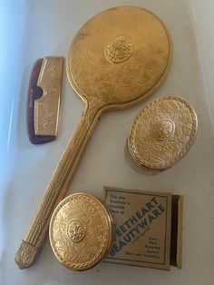 Vintage 1930s Filigree Hand Mirror and accessories. Sweetheart Beautyware. Given as Gifts at Movie Theaters in The 1930s. Never Used Gold and Glass are Good. Includes mirror, Small ring box, and compact still in it's original box. Very Rare Estate Find. 1930s Aesthetic, Tailor Shop, Dresser Sets, Gold Aesthetic, Vintage Makeup, Hand Mirror, Gold Hands, Small Rings, Movie Theater