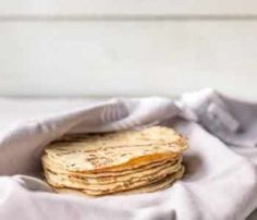 a stack of crackers sitting on top of a cloth