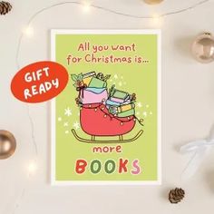 a christmas card with an image of a sleigh filled with gifts and the words, all you want for christmas is more books