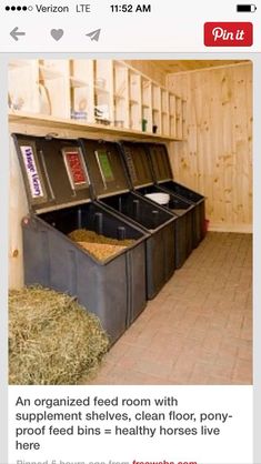 the inside of a storage room with several bins full of dirt and hay in it