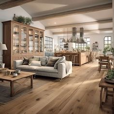 a living room filled with furniture and wooden floors