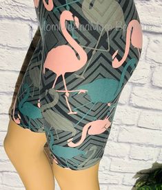 When the weather is heating up stay cool and dry in our flamingo print biker shorts for Women. The newest buttery soft shorts in the USA. They are squat proof, not see through and sewn with serged seams for durability and strength. We also heat press our shorts for fade resistance. These fitted shorts are the perfect fashion shorts for travel, yoga, walking, fitness, gym or casual wear. Place your order today and we process your order immediately. All orders have a USPS tracking number so you ca Pink Stretch Biker Shorts For Summer, Trendy Pink Mid-thigh Length Biker Shorts, Trendy Pink Summer Biker Shorts, Trendy Pink Biker Shorts For Summer, Trendy Pink Biker Shorts For Spring, Trendy Pink Biker Shorts, Casual Pink Above Knee Biker Shorts, Pink Fitted Biker Shorts Above Knee, Fitted Pink Biker Shorts Above Knee