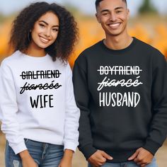 Funny Couple Sweatshirt, Boyfriend Fiance Husband, Girlfriend Fiance Wife, Valentines Day Gift, Anniversary Gift, Gift for her, Gift for him 👉HOW TO ORDER👈 1️⃣  Choose your T-shirt color 2️⃣  Choose your T-Shirt size 3️⃣  Choose your design & text color 4️⃣ Need more Items? Add the current item in the cart. And If you like to add more items to your order please press the back button and repeat steps 1-3 again. 5️⃣Once all your desired items are in your cart you may complete your order by enter Girlfriend Fiance Wife Shirt, Wife Sweater, Couples Matching Sweaters, Hubby Wifey Shirts, Wifey Sweatshirt, Married Shirt, Couples Sweaters, Wedding Party Shirts, Honeymoon Shirts