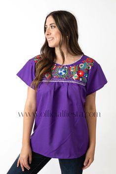 Mexican Embroidered Pueblo Blouse - Purple  These fabulous blouses feature a unique colorful embroidered pattern. These embroidered blouses are also commonly known as Mexican Peasant Blouse Tops.  Please note that each blouse is individually hand embroidered so the embroidery design will vary from the one pictured. You will receive the blouse color selected. Folk Style Blouse For Fiesta, Purple Embroidered Short Sleeve Blouse, Embroidered Bohemian Purple Blouse, Bohemian Embroidered Purple Blouse, Embroidered Fiesta Blouse, Purple Embroidered Bohemian Blouse, Folk Style Short Sleeve Blouse For Fiesta, Bohemian Purple Embroidered Blouse, Bohemian Purple Blouse With Floral Embroidery