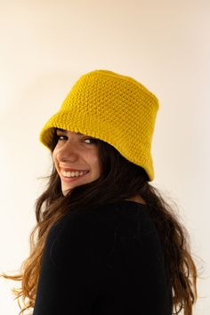 Crochet wool fisherman hat. I made this hat in a warm yellow alpaca wool blend. It is a large and comfortable boho style hat that is very comfortable to wear. The hat can be folded without losing its shape. Created and produced by Allegretta Handmade® © All rights reserved COMPOSITION Alpaca wool blend COLORS Yellow SIZE XL Hat circumference 58-60 cm / 23 inch WASHING ADVISE Hand wash with mild soap.  Dry flat.  USEFUL INFORMATION  The artisanal realization can determine very small variations of Crochet Fisherman Hat, Oversized Hat, Wool Crochet, Women Hat, Crochet Bucket Hat, Crochet Wool, Fisherman Hat, Christmas Gifts For Friends, Gift For Friend