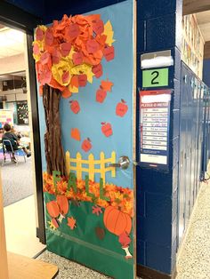 a classroom door decorated with fall decorations