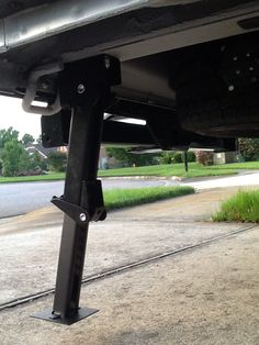 the underside of a vehicle parked in a driveway