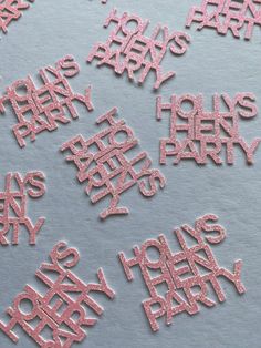 pink glittered letters spelling out happy new year