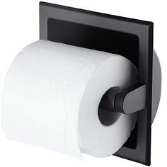 a roll of toilet paper sitting on top of a black wall mounted tissue dispenser