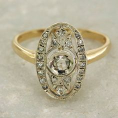 Art Deco style Ring, 14k Gold and Diamond Ring, Antique Style Ring, Italian Gold Ring by ViaDeiGioielli on Etsy https://www.etsy.com/listing/712363639/art-deco-style-ring-14k-gold-and-diamond Oval Yellow Gold Diamond Halo Ring, Oval Cluster Ring With Single Cut Diamonds, Yellow Gold Oval Signet Ring With Diamond Accents, Classic Oval Signet Ring With Rose Cut Diamonds, Classic Oval Signet Ring With Center Stone, Gold Art Deco Ring With Halo Setting, Art Deco Gold Rings With Halo Setting, Art Deco Gold Jewelry With Halo Setting, Gold Art Deco Rings With Halo Setting