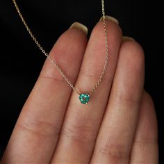 Green, Gorgeous, and Guaranteed to Bring Smiles! 💚  #emerald #giftsforher Heart-shaped Emerald Necklaces For Anniversary, Gold Heart-cut May Birthstone Necklaces, Gold Heart Cut Necklaces For May Birthstone, 14k Gold Heart Necklace With Gemstone, Heart Cut Emerald Necklace For Gift, Emerald Heart Cut Necklace For Anniversary, Emerald Heart Gemstone Necklace, Heart-shaped Emerald Jewelry With Birthstone, Heart Cut Emerald Necklace For Anniversary