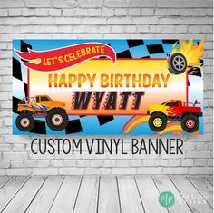 a birthday banner with monster trucks on it