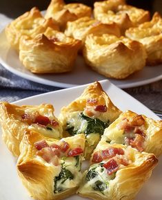 there are several small pastries on the plates next to each other, including one with bacon and spinach