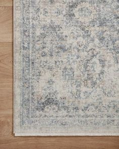 an area rug with blue and white colors