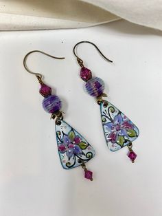 Pink Bohemian Hand Painted Jewelry, Pink Enamel Earrings For Gift, Purple Metal Earrings As Gift, Purple Metal Earrings For Gift, Vintage Hand Painted Pink Jewelry, Pink Flower Earrings As Gift, Pink Hand Painted Dangle Earrings, Unique Purple Earrings With Ear Wire, Pink Hand Painted Earrings For Gift