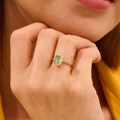 Indulge in the charm of our 14k Gold Mint Tourmaline Engagement Ring. This solid gold ring showcases a stunning minty blue tourmaline gemstone, skillfully set in a bezel for a touch of timeless elegance. The delicate hue of the tourmaline lends a sense of sophistication to this solitaire ring. Meticulously crafted, this ring is not just a symbol of love but also a graceful accessory that complements various styles. Whether chosen as an engagement ring or a promise ring, this Dainty Crystal Ring Rose Gold Top, Cable Reel, Gemstone Solitaire Ring, Tourmaline Engagement Ring, Ring Bezel, Solid Gold Band, Blue Tourmaline, Mint Blue, Tourmaline Ring