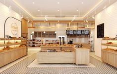 the interior of a bakery with breads and pastries